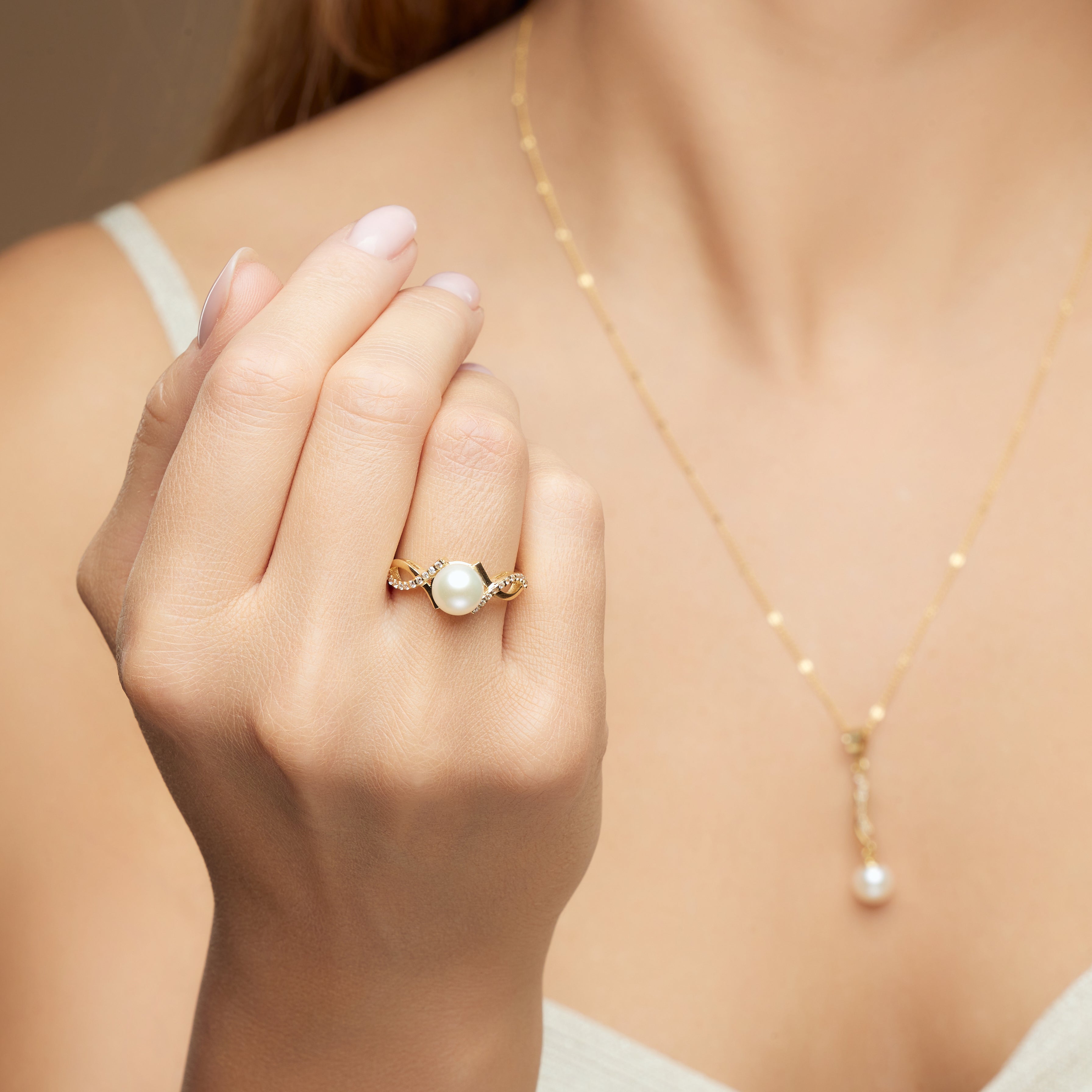Gold pearl ring – ‘Lustré' ring with Zircona twist in 14k solid gold